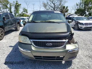 2002 Ford Windstar LTD с VIN 2FMDA584X2BB08402, выставлен на аукционе Copart как лот 55467615 с пробегом 172 717 миль миль и Списание • Salvage title. История ставок и продаж доступна на DreamBid. Изображение 5.
