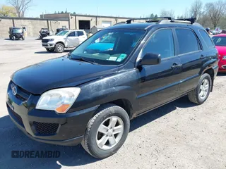 2010 Kia Sportage LX with VIN KNDKGCA34A7669279, listed as a IAAI auction lot 42132770 with 142,828 mi miles and . Bid and sale history available at carsss.com. Image 2.