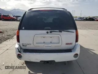 2006 GMC Envoy SLE z VIN 1GKDT13S462156541, wystawiony jako Copart lot #52500615 z przebiegiem 140 558 mil mil oraz Szkody całkowita. Historia ofert i sprzedaży dostępna na DreamBid. Obrazek 6.