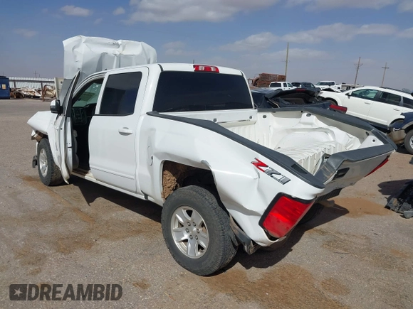 2018 Chevrolet Silverado 1500 LT with VIN 3GCUKREC9JG316576, listed as a IAAI auction lot 41830992 with 153,467 mi miles. Bid and sale history available at carsss.com. Image 3.