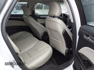 2016 Ford Fusion Titanium with VIN 3FA6P0K92GR400269, listed as a IAAI auction lot 41961043 with 191,638 mi miles and . Bid and sale history available at DreamBid. Image 8.