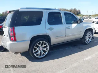 2011 GMC Yukon Denali with VIN 1GKS2EEF3BR350688, listed as a IAAI auction lot 41993776 with 241,941 mi miles. Bid and sale history available at carsss.com. Image 4.