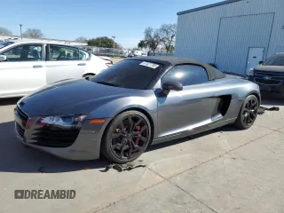 2011 Audi R8 z VIN WUASUAFG9BN002572, wystawiony jako Copart lot #47427785 z przebiegiem 51 113 mil mil oraz Szkody całkowita. Historia ofert i sprzedaży dostępna na DreamBid. Obrazek 1.