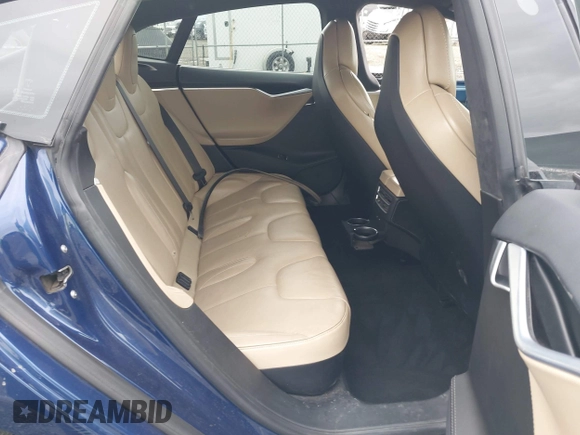 2017 Tesla Model S 100D with VIN 5YJSA1E25HF184502, listed as a IAAI auction lot 41834310 with 92,887 mi miles and . Bid and sale history available at DreamBid. Image 8.