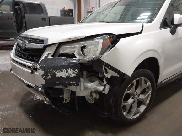 2018 Subaru Forester Touring with VIN JF2SJAWC8JH463943, listed as a IAAI auction lot 41611230 with 65,444 mi miles. Bid and sale history available at carsss.com. Image 6.
