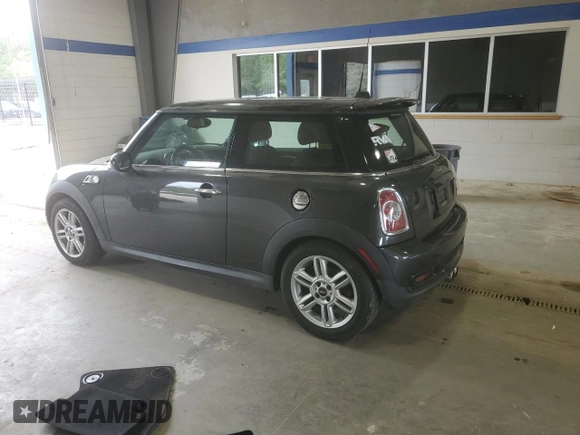 2013 MINI Hardtop S with VIN WMWSV3C57DT396593, listed as a Copart auction lot 53610125 with 116,193 mi miles and Salvage Title. Bid and sale history available at DreamBid. Image 2.