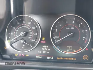 2015 BMW 2 Series M235i with VIN WBA1J7C55FV358964, listed as a IAAI auction lot 41674800 with 63,504 mi miles and . Bid and sale history available at carsss.com. Image 7.