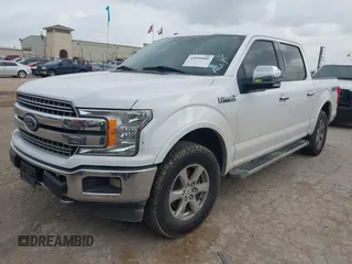 2018 Ford F-150 XL with VIN 1FTEW1EG5JKD32988, listed as a IAAI auction lot 42099086 with 127,541 mi miles. Bid and sale history available at carsss.com. Image 2.