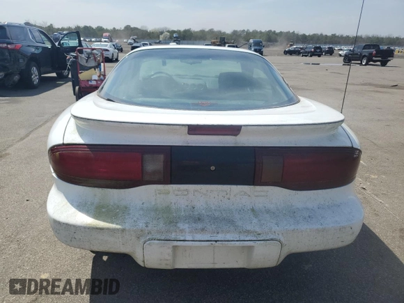 1994 Pontiac Firebird Firebird z VIN 2G2FS22S2R2242528, wystawiony jako Copart lot #53204735 z przebiegiem 105 253 mil mil oraz Czysty tytuł • Clean title. Historia ofert i sprzedaży dostępna na DreamBid. Obrazek 6.