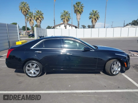 2016 Cadillac CTS Luxury Collection RWD z VIN 1G6AR5SS8G0156144, wystawiony jako IAAI lot #42087602 z przebiegiem Nie podano mil oraz . Historia ofert i sprzedaży dostępna na DreamBid. Obrazek 13.
