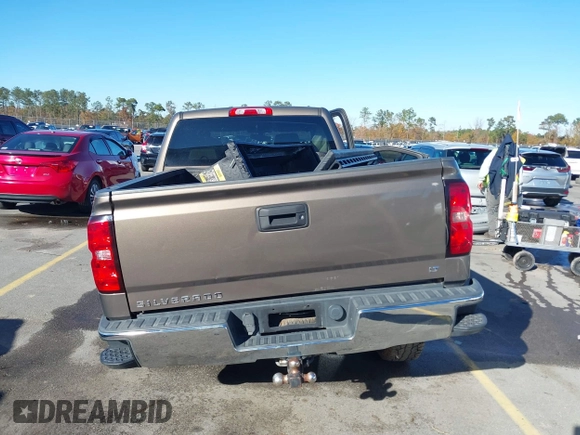 2014 Chevrolet Silverado 1500 LT with VIN 1GCRCREH5EZ165367, listed as a IAAI auction lot 41076729 with 130,425 mi miles and . Bid and sale history available at DreamBid. Image 16.