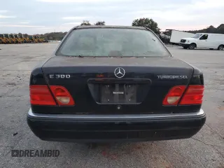 1998 Mercedes-Benz E 320 with VIN WDBJF25F0WA684027, listed as a Copart auction lot 82171114 with 259,427 mi miles and Salvage Title. Bid and sale history available at DreamBid. Image 6.