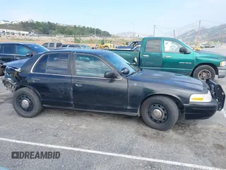 2007 Ford Police Interceptor z VIN 2FAHP71W97X148174, wystawiony jako IAAI lot #41889052 z przebiegiem Nie podano mil oraz . Historia ofert i sprzedaży dostępna na DreamBid. Obrazek 13.