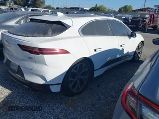 2020 Jaguar I-Pace SE with VIN SADHC2S14L1F85800, listed as a IAAI auction lot 42444115 with 51,249 mi miles and . Bid and sale history available at DreamBid. Image 4.
