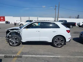 2021 Audi Q3 S line Premium Plus with VIN WA1EECF31M1063905, listed as a IAAI auction lot 41588919 with 31,739 mi miles and . Bid and sale history available at DreamBid. Image 12.
