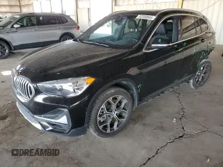 2020 BMW X1 xDrive28i z VIN WBXJG9C07L5R69479, wystawiony jako Copart lot #53590885 z przebiegiem 34 230 mil mil oraz Szkoda całkowita • Salvage title. Historia ofert i sprzedaży dostępna na DreamBid. Obrazek 1.