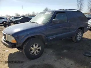 2003 GMC Jimmy z VIN 1GKCT18X43K110056, wystawiony jako Copart lot #48671585 z przebiegiem 272 867 mil mil oraz Czysty tytuł • Clean title. Historia ofert i sprzedaży dostępna na DreamBid. Obrazek 1.