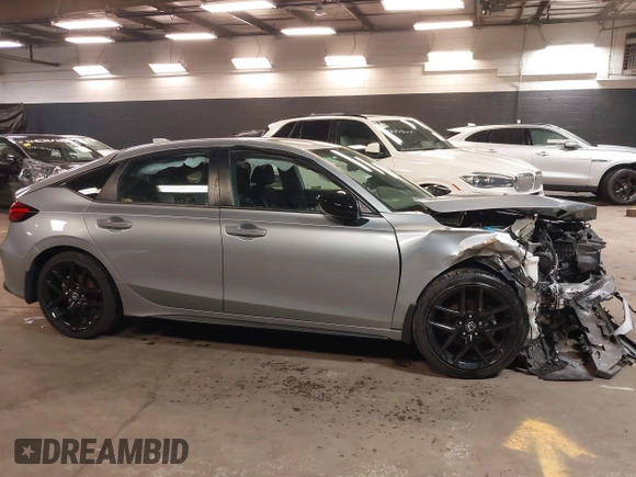 2023 Honda Civic Sport z VIN 19XFL2H83PE010062, wystawiony jako IAAI lot #41829519 z przebiegiem 37 974 mil mil oraz . Historia ofert i sprzedaży dostępna na DreamBid. Obrazek 13.