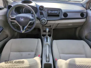 2010 Honda Insight LX with VIN JHMZE2H51AS011243, listed as a Copart auction lot 54445555 with 224,722 mi miles and Salvage Title. Bid and sale history available at DreamBid. Image 8.