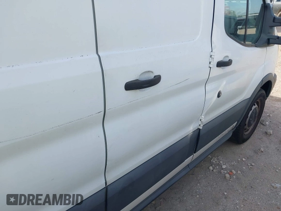 2016 Ford Transit Cargo with VIN 1FTYE1ZM0GKB06687, listed as a IAAI auction lot 42232871 with 330,423 mi miles and . Bid and sale history available at DreamBid. Image 17.