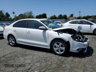 2014 Volkswagen Jetta TDI w/Premium with VIN 3VW3L7AJ4EM372687, listed as a Copart auction lot 55284225 with 95,645 mi miles and Salvage title. Bid and sale history available at DreamBid. Image 4.