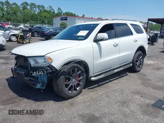 2014 Dodge Durango Limited z VIN 1C4RDJDG2EC383471, wystawiony jako IAAI lot #42739695 z przebiegiem 129 233 mil mil oraz . Historia ofert i sprzedaży dostępna na DreamBid. Obrazek 2.