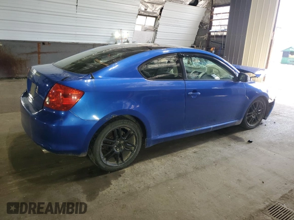 2006 Scion tC z VIN JTKDE167660131545, wystawiony jako Copart lot #54702365 z przebiegiem Nie podano mil oraz Szkoda całkowita • Salvage title. Historia ofert i sprzedaży dostępna na DreamBid. Obrazek 3.