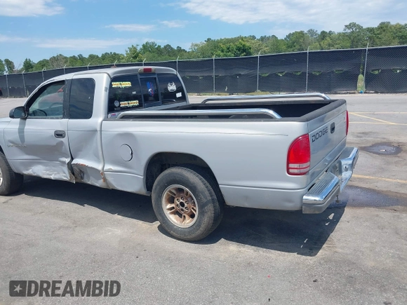 1999 Dodge Dakota SLT z VIN 1B7GL22X9XS258964, wystawiony jako IAAI lot #42309862 z przebiegiem 177 561 mil mil oraz . Historia ofert i sprzedaży dostępna na DreamBid. Obrazek 3.
