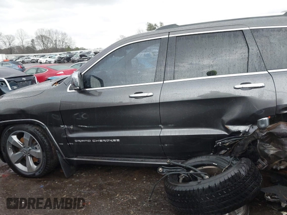 2014 Jeep Grand Cherokee Overland with VIN 1C4RJFCT2EC146239, listed as a IAAI auction lot 41368514 with 164,239 mi miles. Bid and sale history available at carsss.com. Image 14.