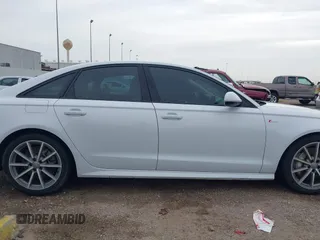 2018 Audi A6 Premium Plus z VIN WAUG3AFC7JN041708, wystawiony jako IAAI lot #41670779 z przebiegiem 91 753 mil mil oraz . Historia ofert i sprzedaży dostępna na DreamBid. Obrazek 14.