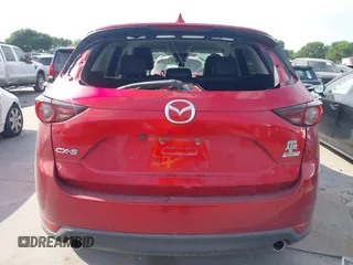 2017 Mazda CX-5 Touring with VIN JM3KFACL3H0195212, listed as a IAAI auction lot 42041361 with 57,377 mi miles and . Bid and sale history available at carsss.com. Image 16.