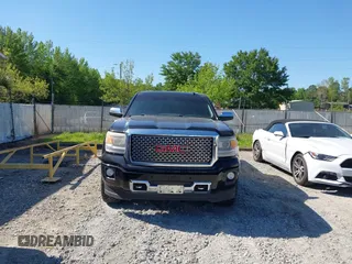 2015 GMC Sierra 1500 Denali with VIN 3GTU2WEJ6FG400004, listed as a IAAI auction lot 42097356 with 148,544 mi miles and . Bid and sale history available at DreamBid. Image 12.