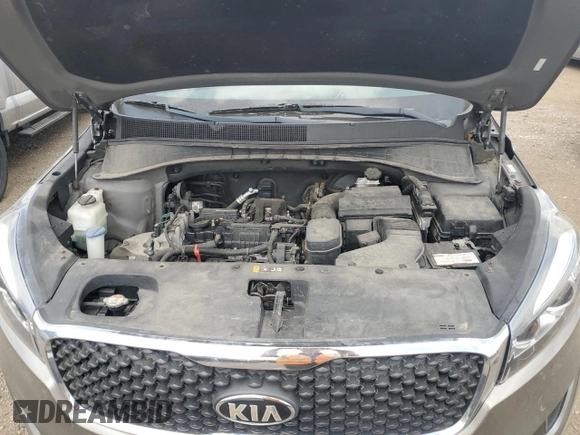 2017 Kia Sorento LX z VIN 5XYPG4A33HG329565, wystawiony jako Copart lot #56871105 z przebiegiem 92 652 mil mil oraz Szkoda całkowita • Salvage title. Historia ofert i sprzedaży dostępna na DreamBid. Obrazek 11.