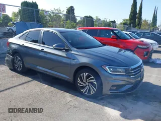 2021 Volkswagen Jetta SEL Premium with VIN 3VWG57BU2MM010344, listed as a IAAI auction lot 42274776 with 57,503 mi miles and . Bid and sale history available at DreamBid. Image 1.