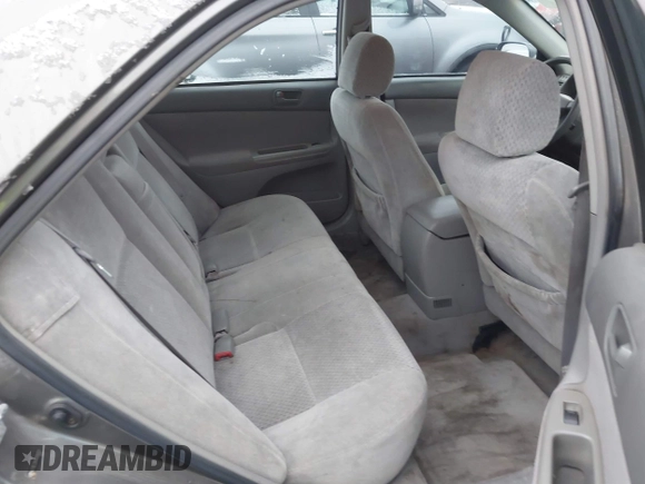 2004 Toyota Camry LE z VIN 4T1BE32K64U896809, wystawiony jako IAAI lot #41075176 z przebiegiem 223 763 mil mil oraz . Historia ofert i sprzedaży dostępna na DreamBid. Obrazek 8.