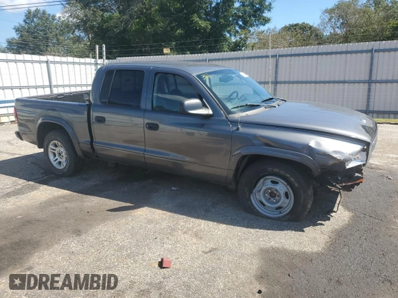 2003 Dodge Dakota Sport with VIN 1D7HL38N43S184708, listed as a Copart auction lot 73320964 with 143,398 mi miles and Salvage Title. Bid and sale history available at carsss.com. Image 4.