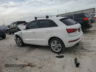 2017 Audi Q3 Premium z VIN WA1BCCFS0HR016968, wystawiony jako Copart lot #79358604 z przebiegiem Nie podano mil oraz Szkody całkowita. Historia ofert i sprzedaży dostępna na DreamBid. Obrazek 2.