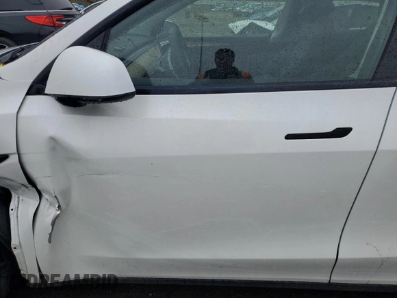 2023 Tesla Model Y Long Range with VIN 7SAYGDEEXPA122953, listed as a Copart auction lot 52627095 with Not Provided miles and Salvage Title. Bid and sale history available at DreamBid. Image 7.