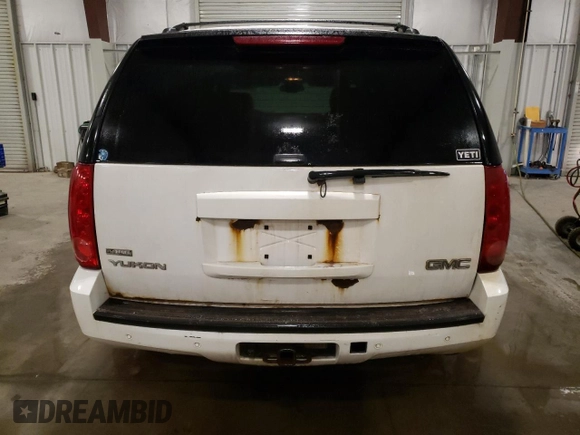 2009 GMC Yukon SLT w/4SB with VIN 1GKFK33099R252828, listed as a Copart auction lot 43205945 with 301,544 mi miles and Salvage Title. Bid and sale history available at carsss.com. Image 6.