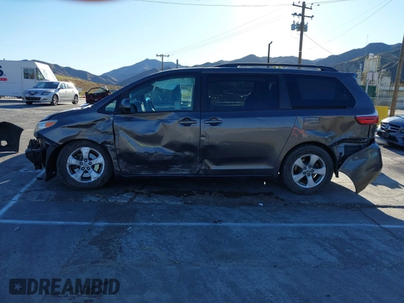 2015 Toyota Sienna LE AAS with VIN 5TDKK3DC3FS529845, listed as a IAAI auction lot 41627102 with 130,334 mi miles. Bid and sale history available at carsss.com. Image 15.