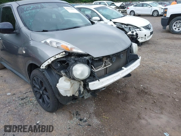 2013 Nissan Juke SV z VIN JN8AF5MR2DT223447, wystawiony jako IAAI lot #42232800 z przebiegiem 204 907 mil mil oraz . Historia ofert i sprzedaży dostępna na DreamBid. Obrazek 13.