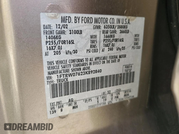 2003 Ford F-150 XLT with VIN 1FTRW07623KB92840, listed as a Copart auction lot 48603105 with 145,516 mi miles and Salvage Title. Bid and sale history available at carsss.com. Image 14.