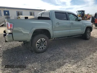 2023 Toyota Tacoma SR z VIN 3TYCZ5AN0PT156688, wystawiony jako Copart lot #51185145 z przebiegiem 4 868 mil mil oraz Szkoda całkowita • Salvage title. Historia ofert i sprzedaży dostępna na DreamBid. Obrazek 3.