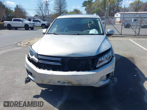 2015 Volkswagen Tiguan SE with VIN WVGAV7AX0FW544218, listed as a IAAI auction lot 41897418 with 97,235 mi miles and . Bid and sale history available at DreamBid. Image 13.