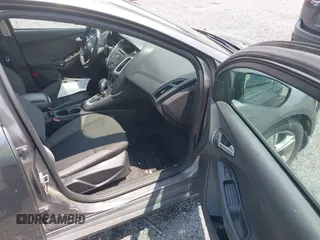 2014 Ford Focus SE z VIN 1FADP3K20EL188088, wystawiony jako IAAI lot #42455783 z przebiegiem 201 105 mil mil oraz . Historia ofert i sprzedaży dostępna na DreamBid. Obrazek 5.