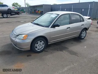 2001 Honda Civic LX with VIN 2HGES16511H554168, listed as a IAAI auction lot 42009621 with 163,801 mi miles. Bid and sale history available at carsss.com. Image 2.