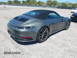 2020 Porsche 911 Carrera S with VIN WP0CB2A97LS263238, listed as a IAAI auction lot 42021346 with 23,899 mi miles. Bid and sale history available at carsss.com. Image 4.