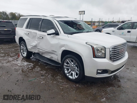 2018 GMC Yukon SLT with VIN 1GKS1BKC8JR392851, listed as a IAAI auction lot 40744741 with 117,028 mi miles. Bid and sale history available at carsss.com. Image 1.
