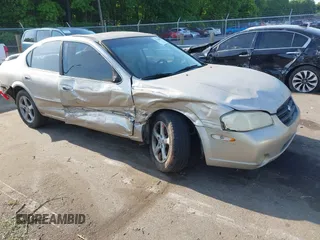 2000 Nissan Maxima GXE with VIN JN1CA31D4YT556029, listed as a IAAI auction lot 42160508 with 227,696 mi miles and . Bid and sale history available at DreamBid. Image 1.