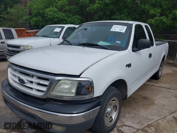 2002 Ford F-150 XL with VIN 1FTRX17202NA10047, listed as a IAAI auction lot 42122396 with 1 mi miles. Bid and sale history available at carsss.com. Image 2.